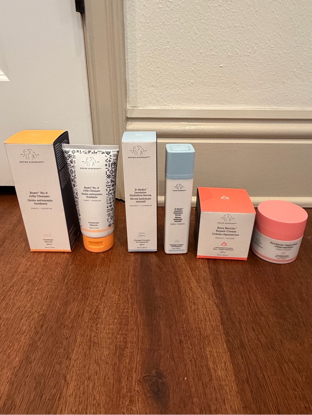 Drunk Elephant Skincare Collection - Orange, Pink & Light Blue Accents